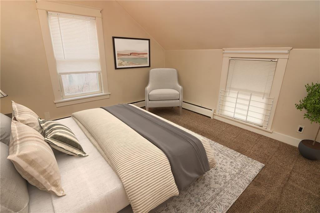 1443 State Avenue Coraopolis, PA 15108 - Photo 12 of 20 a bedroom with a bed and window