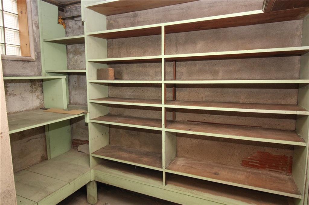 1443 State Avenue Coraopolis, PA 15108 - Photo 17 of 20 a view of walk in closet with empty racks