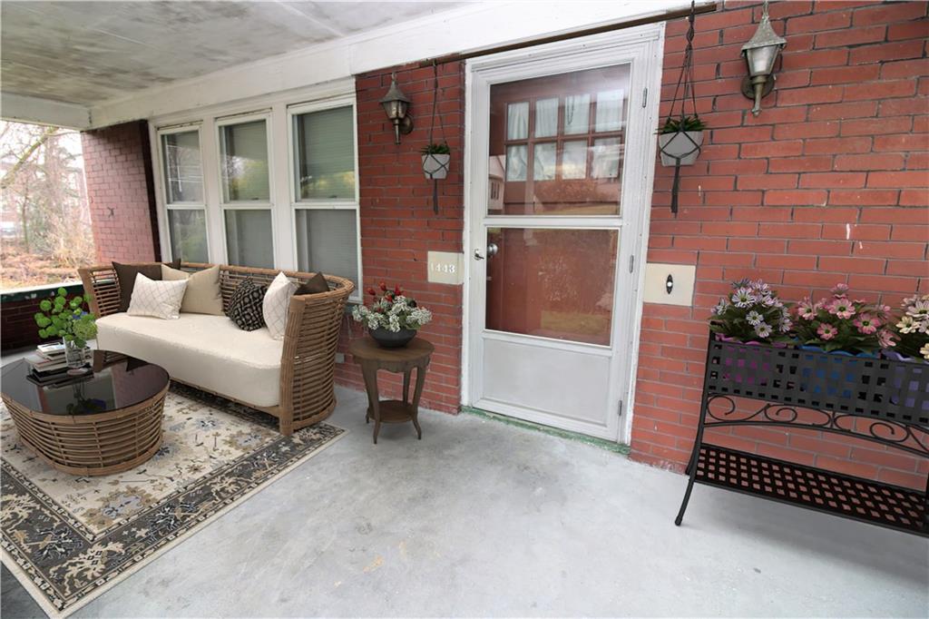 1443 State Avenue Coraopolis, PA 15108 - Photo 3 of 20 a living room with furniture and a potted plant
