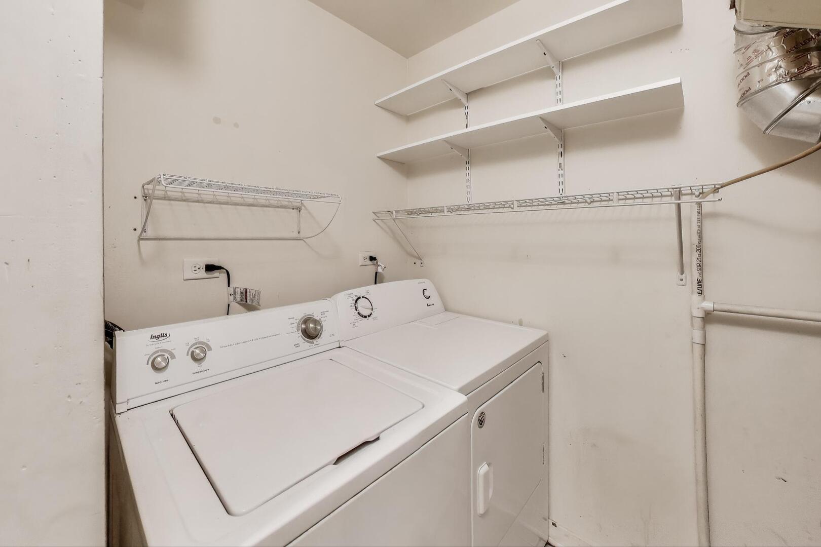 3021 West Armitage Avenue, Unit 208 Chicago, IL 60647 - Photo 15 of 18 a utility room with dryer and washer