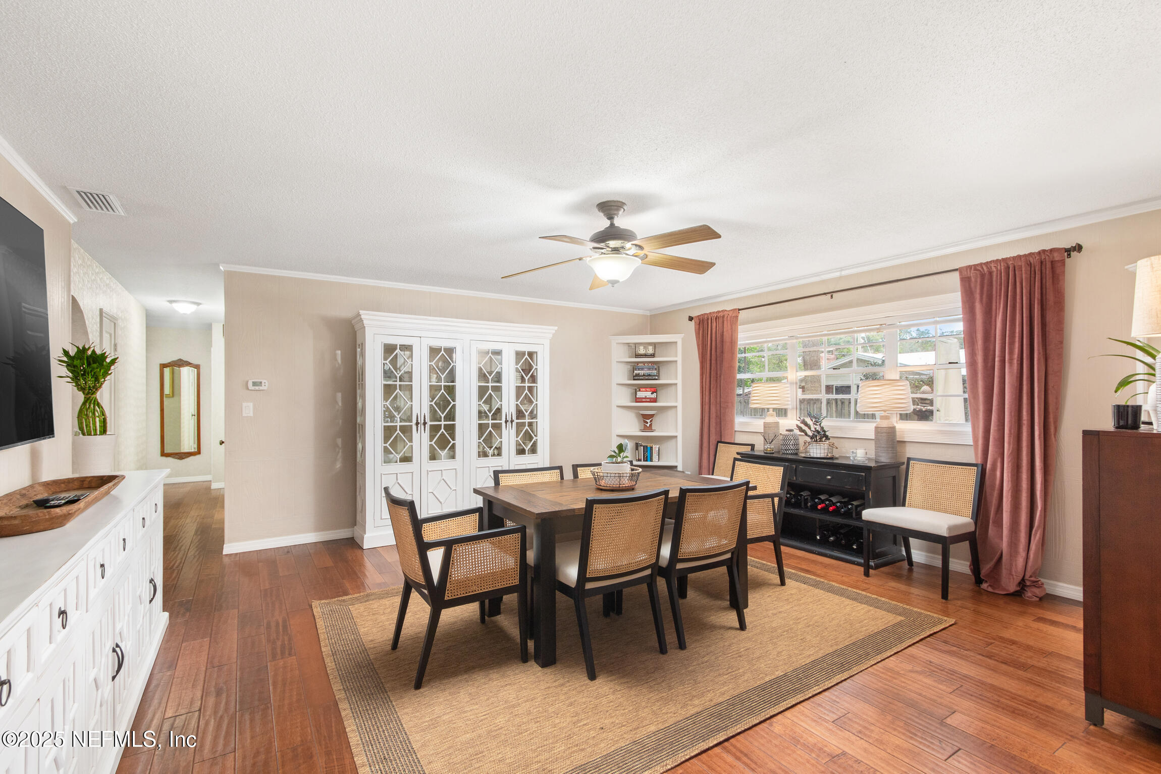 405 Lobelia Road St. Augustine, FL 32086 - Photo 15 of 40 a view of a dining room with furniture window and outside view