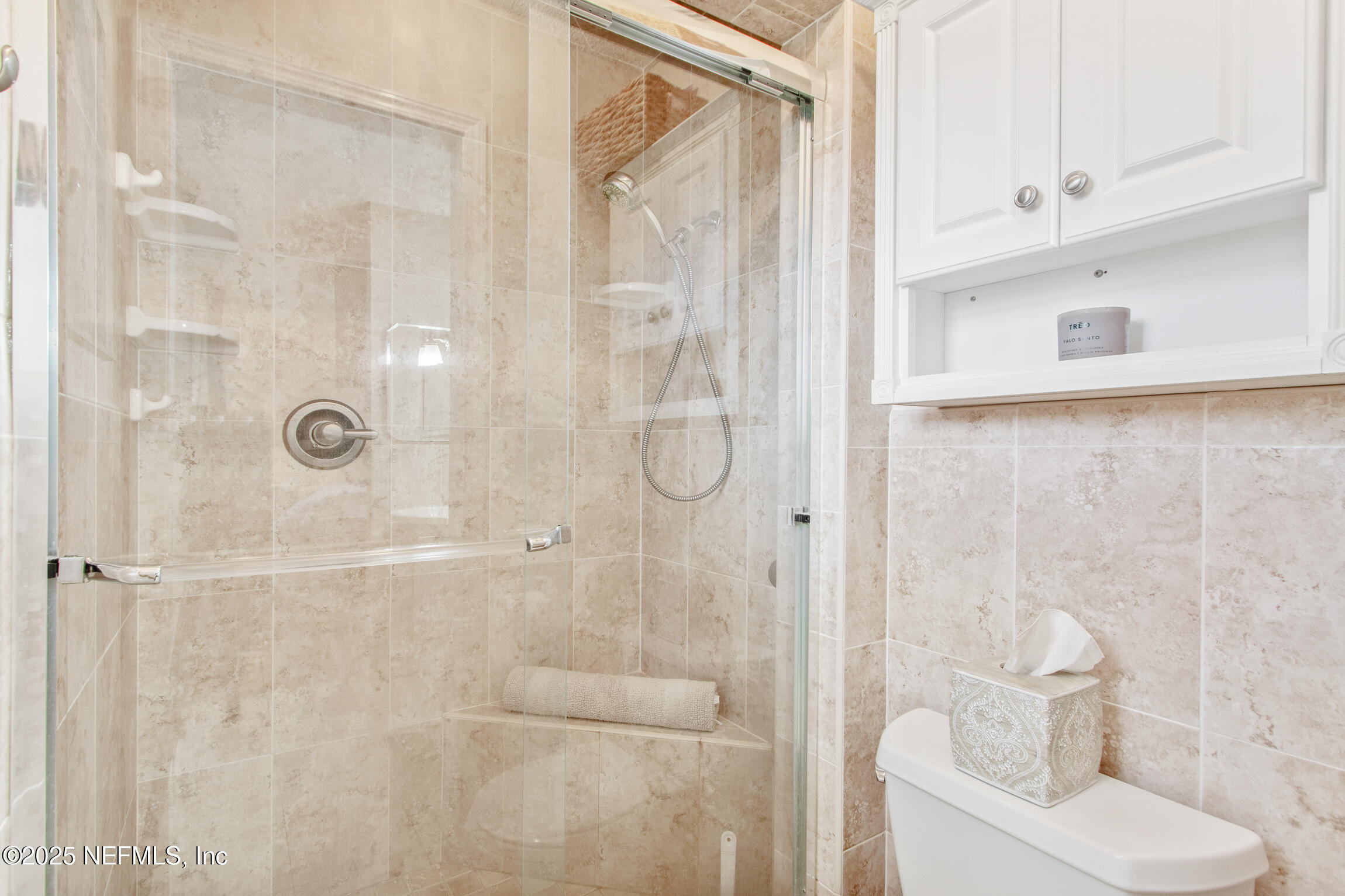 405 Lobelia Road St. Augustine, FL 32086 - Photo 25 of 40 a bathroom with a shower curtain