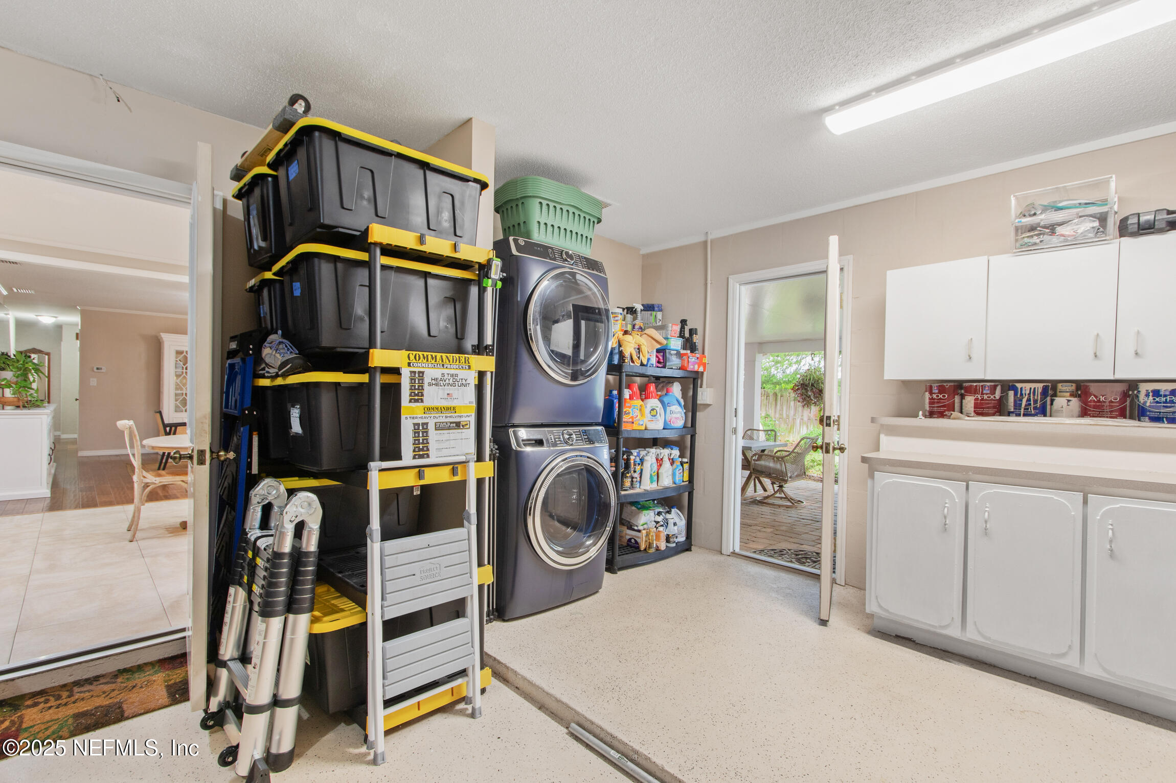 405 Lobelia Road St. Augustine, FL 32086 - Photo 26 of 40 a utility room with dryer and washer