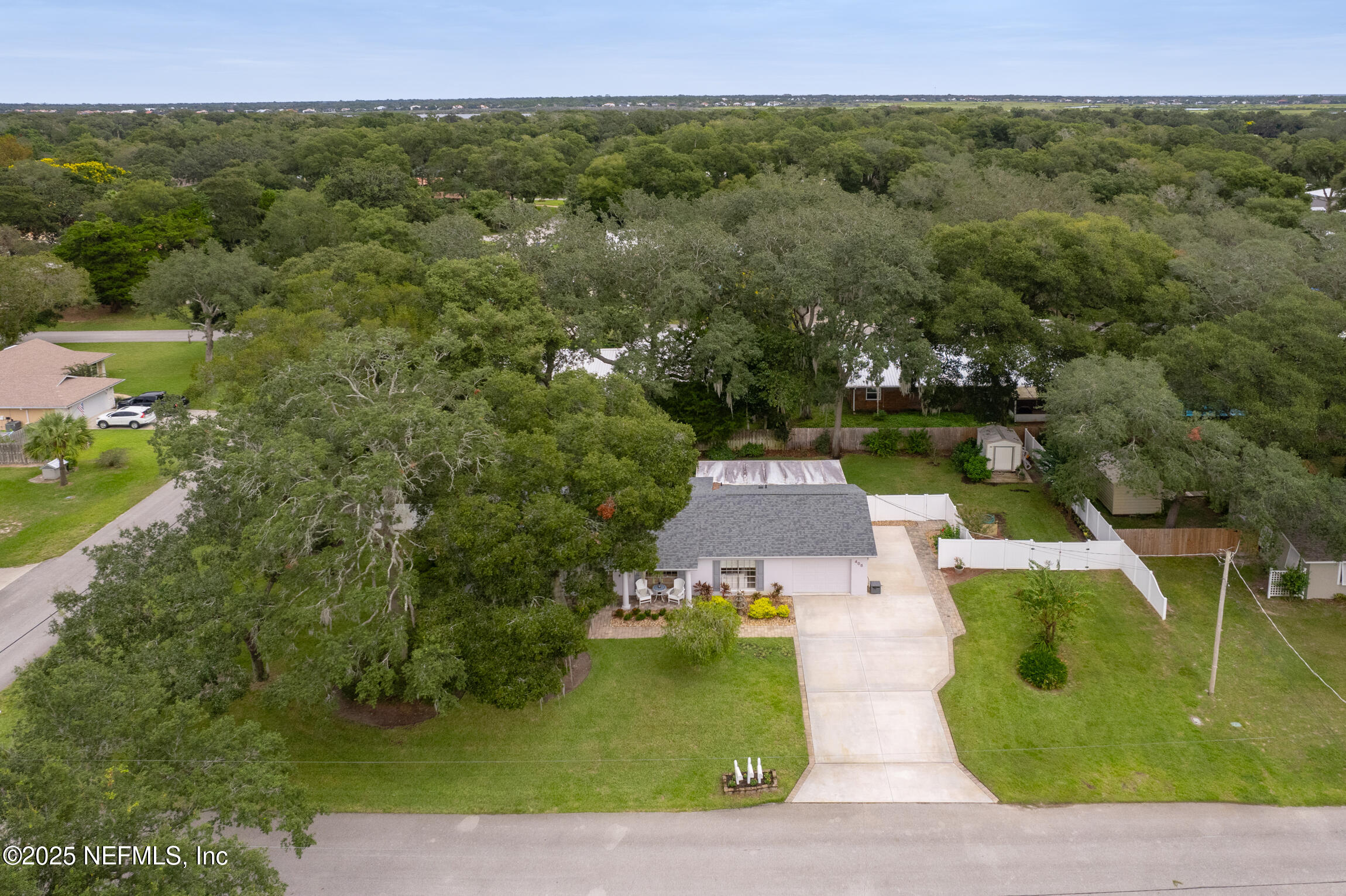 405 Lobelia Road St. Augustine, FL 32086 - Photo 38 of 40 an aerial view of a house with a yard