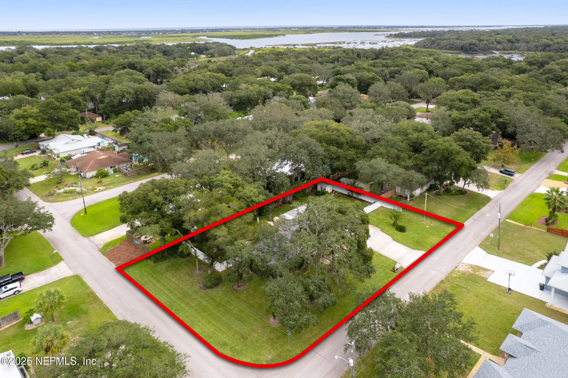 405 Lobelia Road St. Augustine, FL 32086 - Photo 4 of 40 an aerial view of a pool
