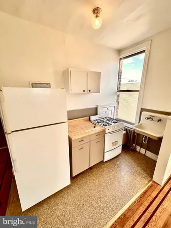 a utility room with washer and dryer
