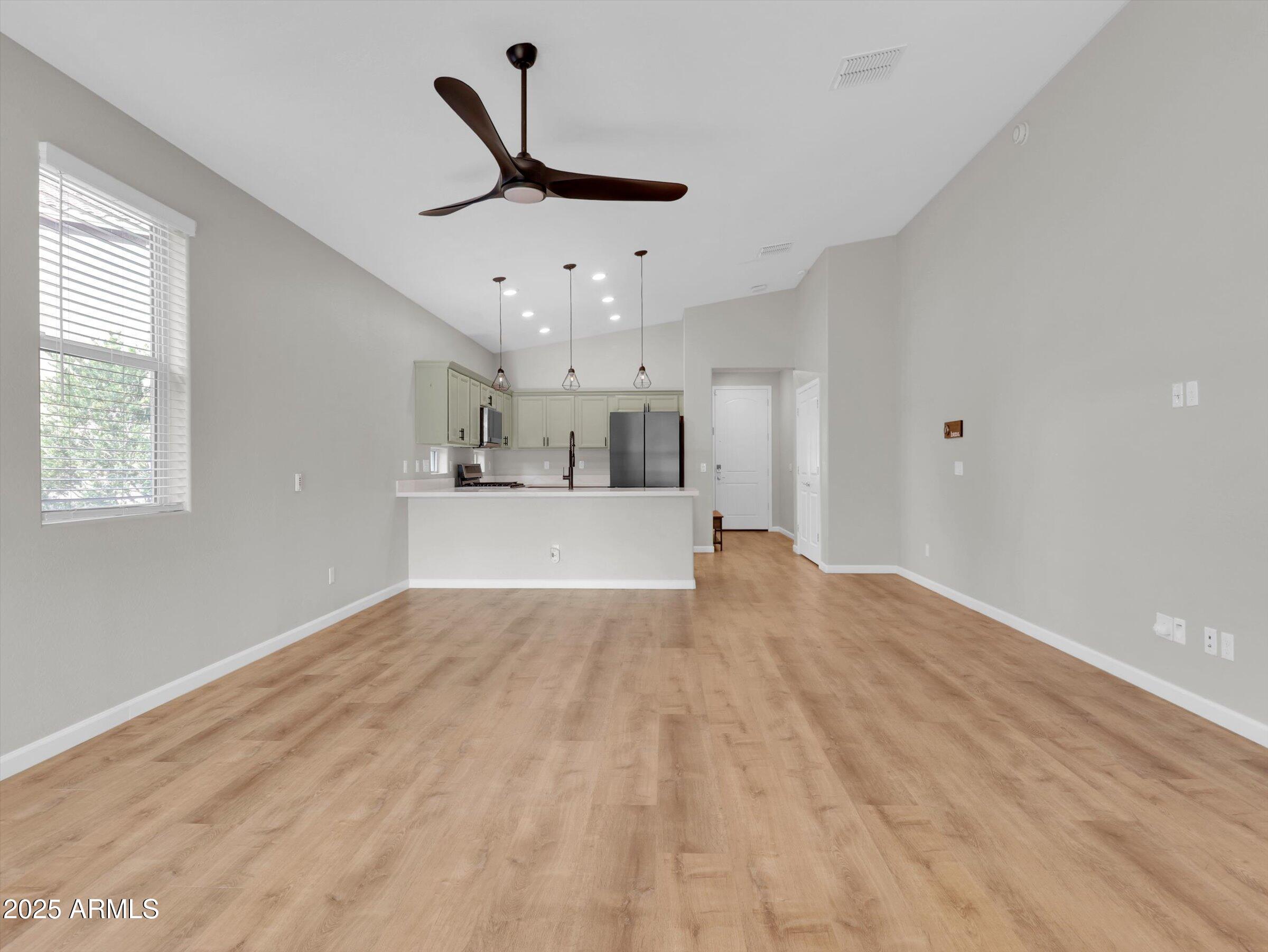 3405 West Alta Vista Road Phoenix, AZ 85041 - Photo 17 of 40 a view of a kitchen with a sink and a window