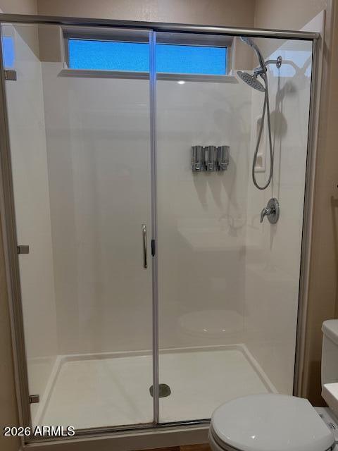 3405 West Alta Vista Road Phoenix, AZ 85041 - Photo 32 of 40 a bathroom with a shower and toilet