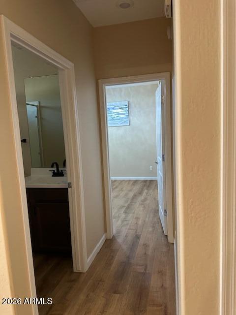 3405 West Alta Vista Road Phoenix, AZ 85041 - Photo 35 of 40 a view of a bathroom from a hallway