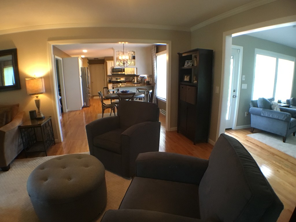 669 Shaker Road Longmeadow, MA 01106 - Photo 13 of 28 a living room with furniture and a fireplace