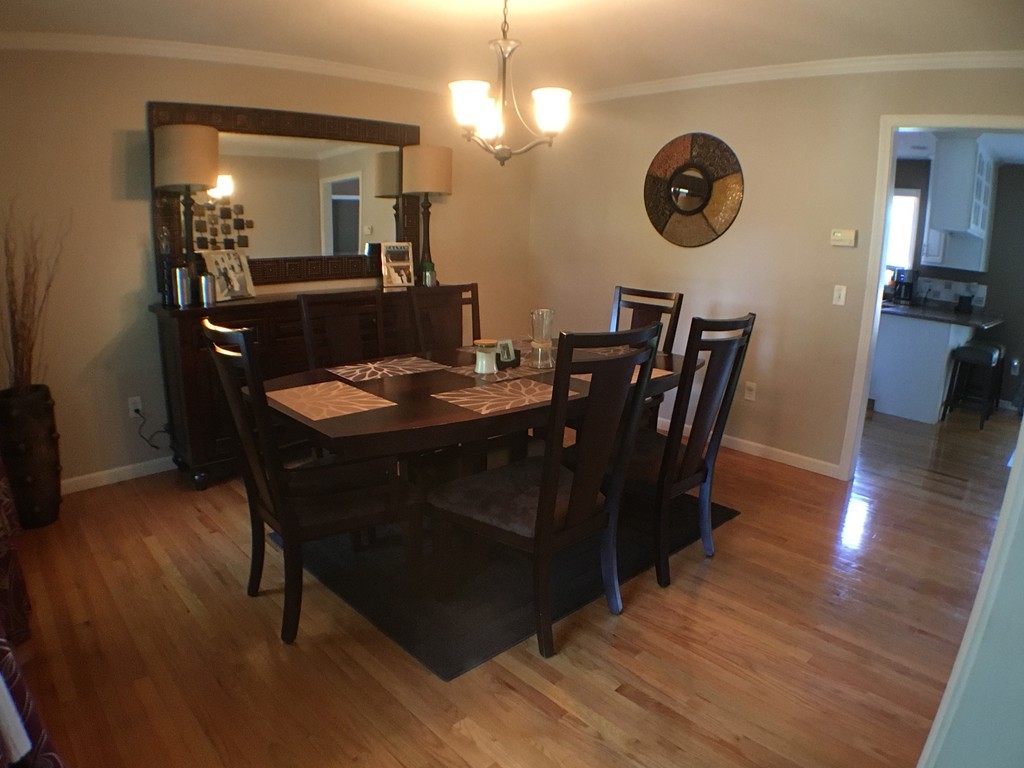 669 Shaker Road Longmeadow, MA 01106 - Photo 14 of 28 a view of a dining room with furniture and wooden floor