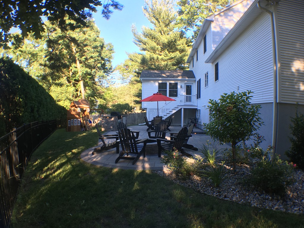 669 Shaker Road Longmeadow, MA 01106 - Photo 2 of 28 a view of a house with a yard porch and sitting area