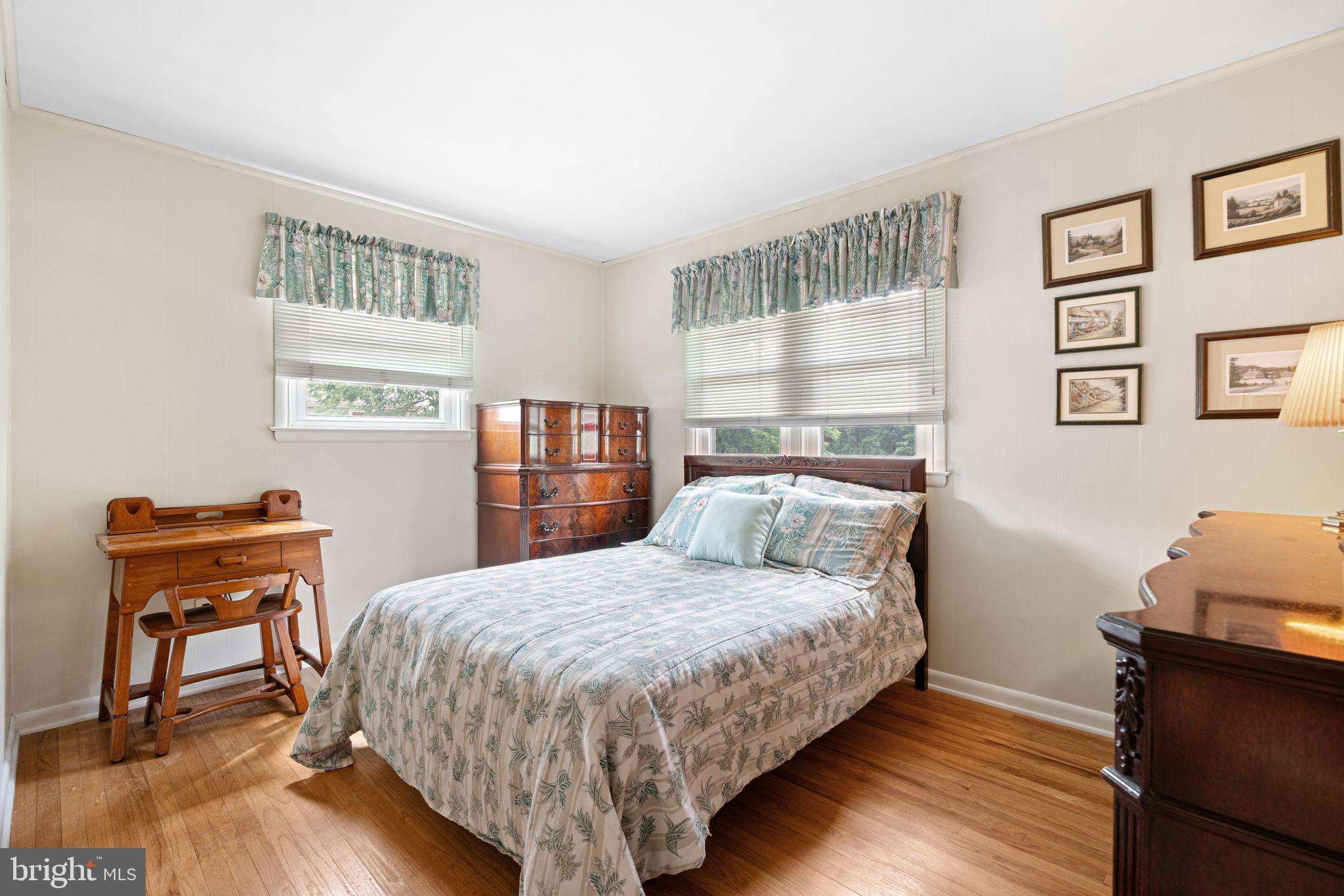 604 Davis Road Barrington, NJ 08007 - Photo 11 of 30 a bedroom with a bed and a desk