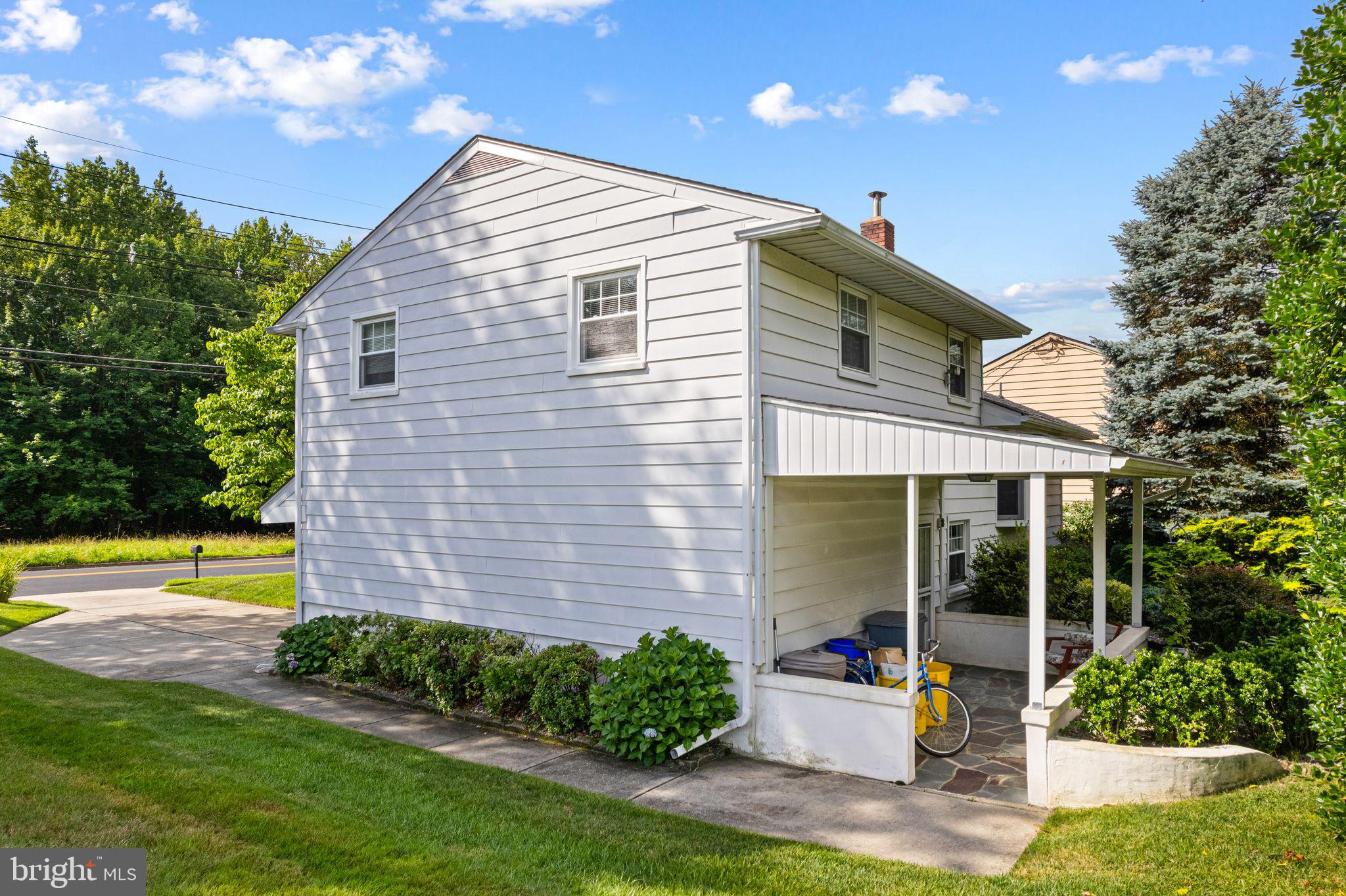604 Davis Road Barrington, NJ 08007 - Photo 21 of 30 a front view of a house with garden