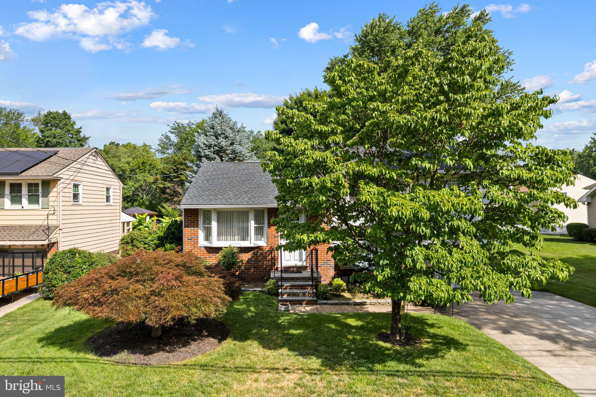 604 Davis Road Barrington, NJ 08007 - Photo 3 of 30 a view of a house with backyard sitting area and garden
