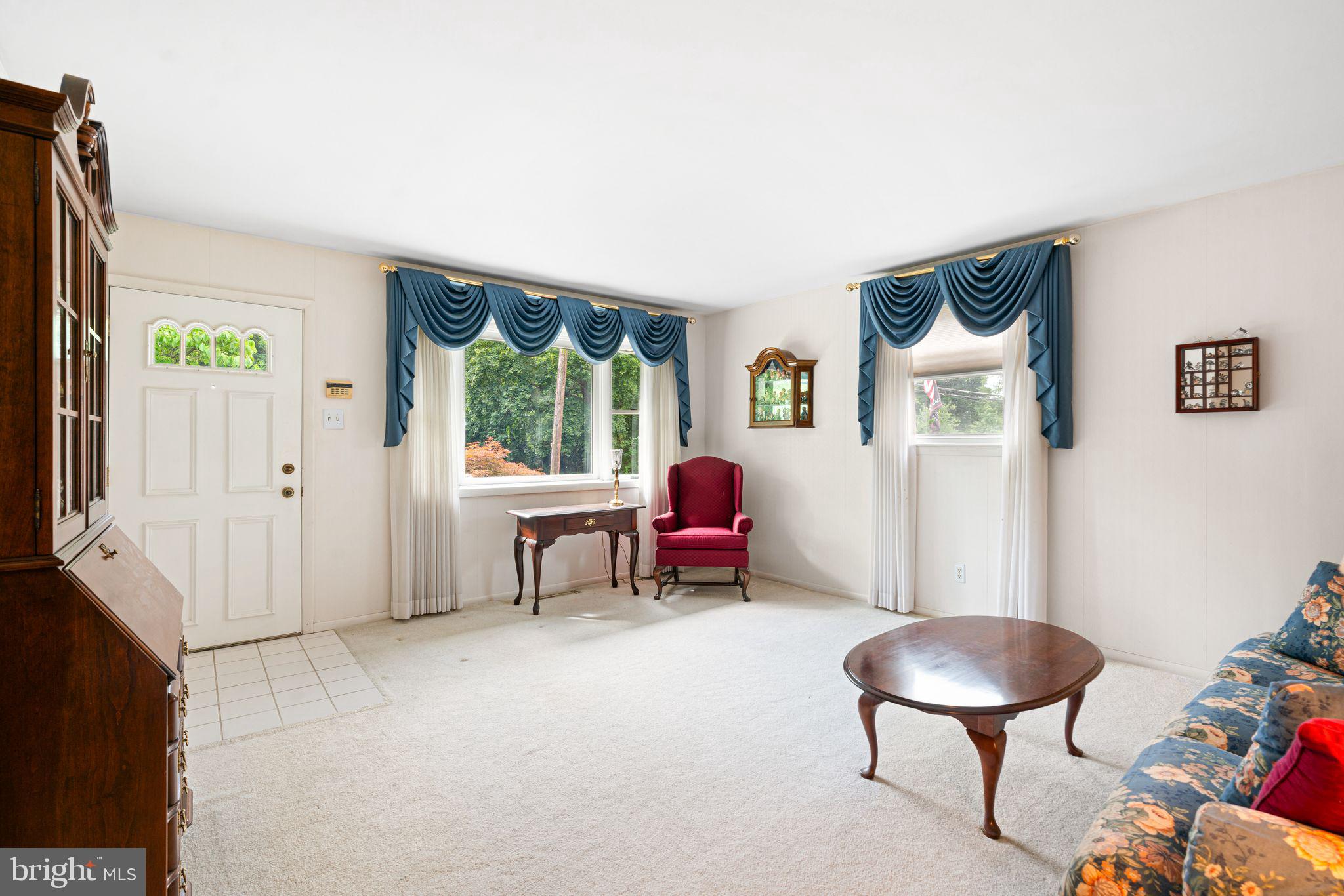604 Davis Road Barrington, NJ 08007 - Photo 4 of 30 a living room with furniture and a window