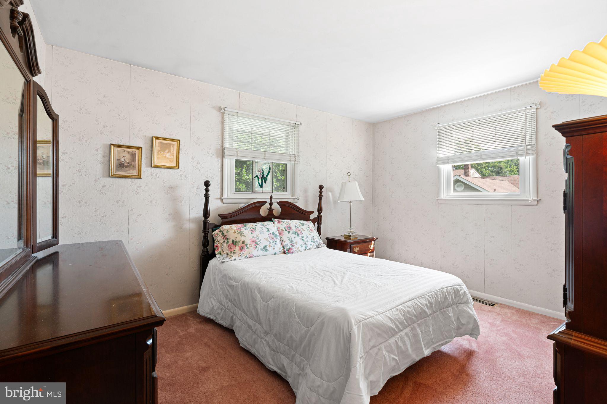 604 Davis Road Barrington, NJ 08007 - Photo 9 of 30 a bedroom with a bed and a window
