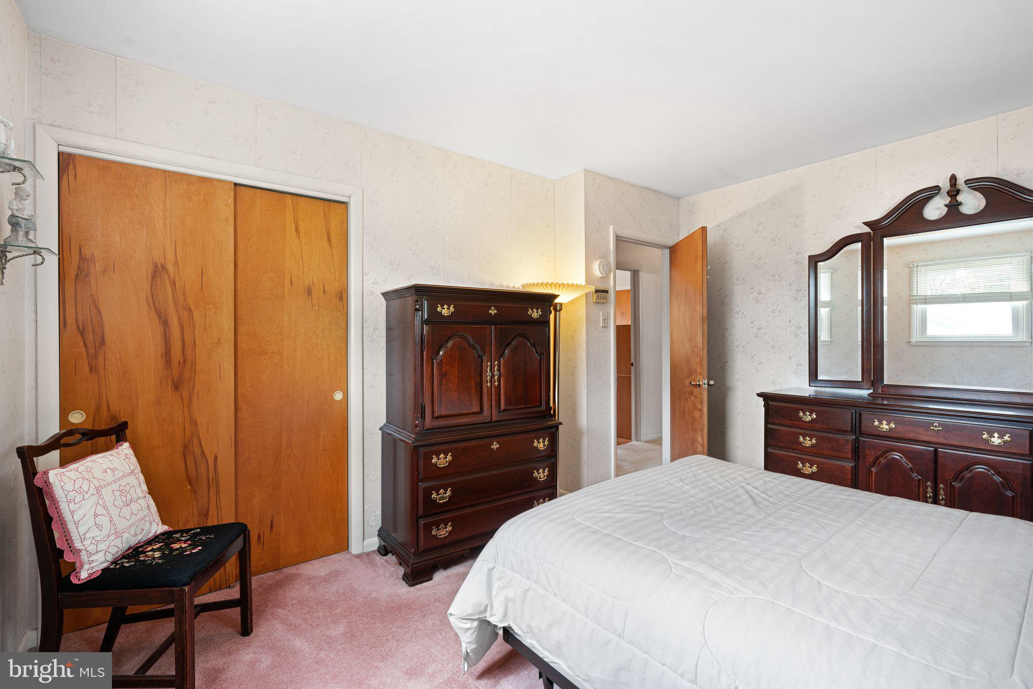 604 Davis Road Barrington, NJ 08007 - Photo 10 of 30 a bedroom with a bed and a dresser
