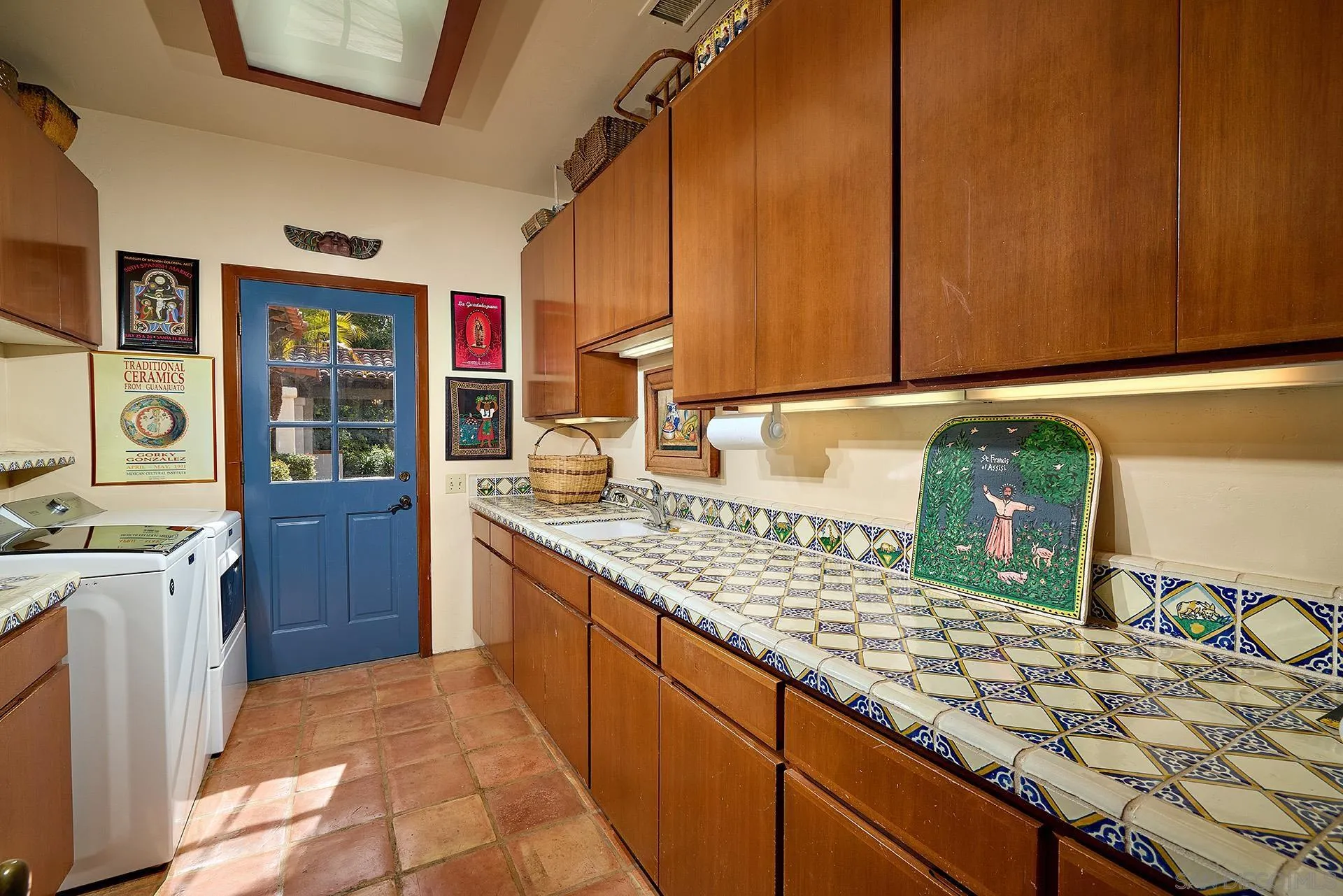 6525 Lago Lindo Rancho Santa Fe, CA 92067 - Photo 28 of 47 Laundry with access to the patio and pool.