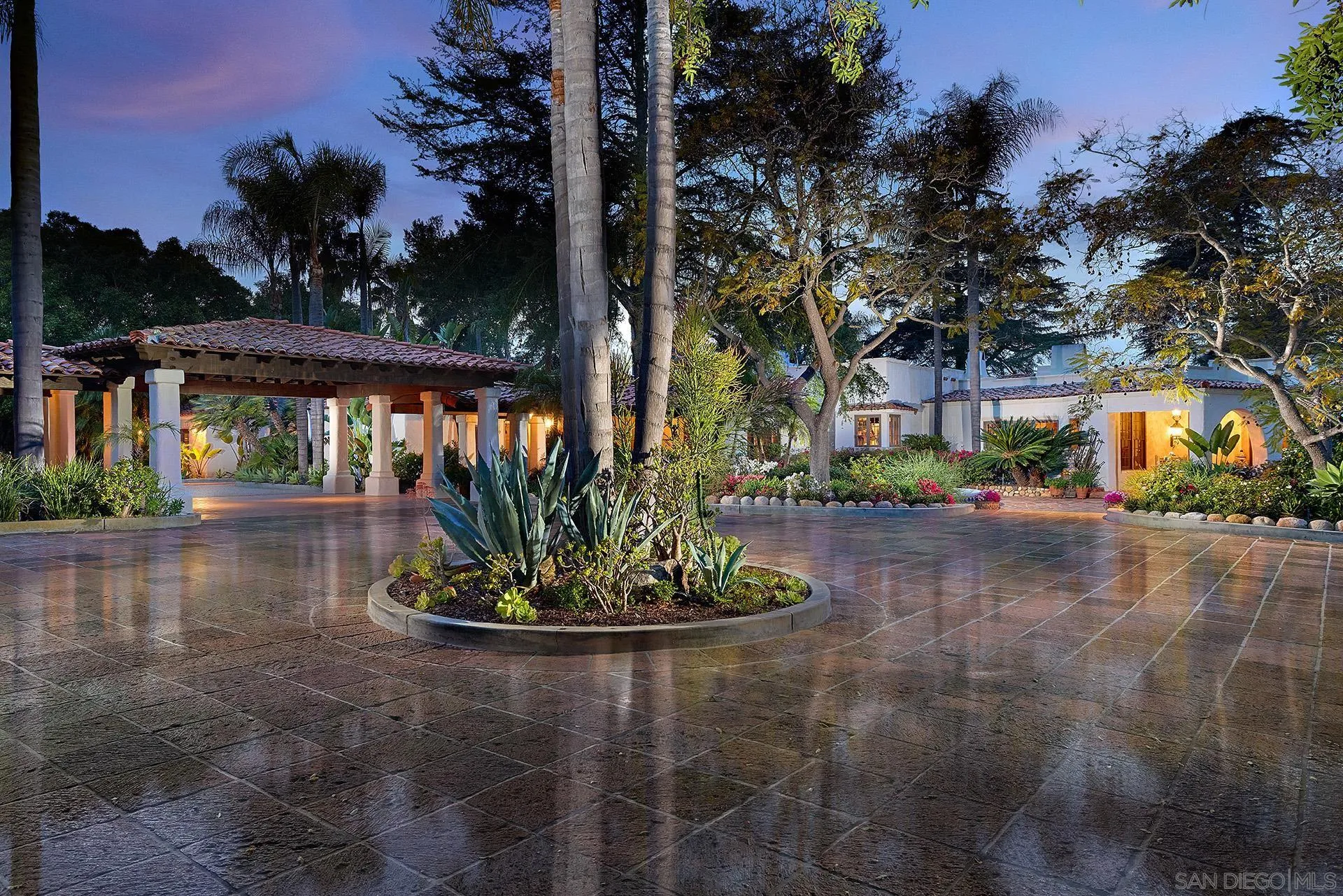 6525 Lago Lindo Rancho Santa Fe, CA 92067 - Photo 3 of 47 Rare Pink Cantera Stone Tiling up through the entry and turnaround