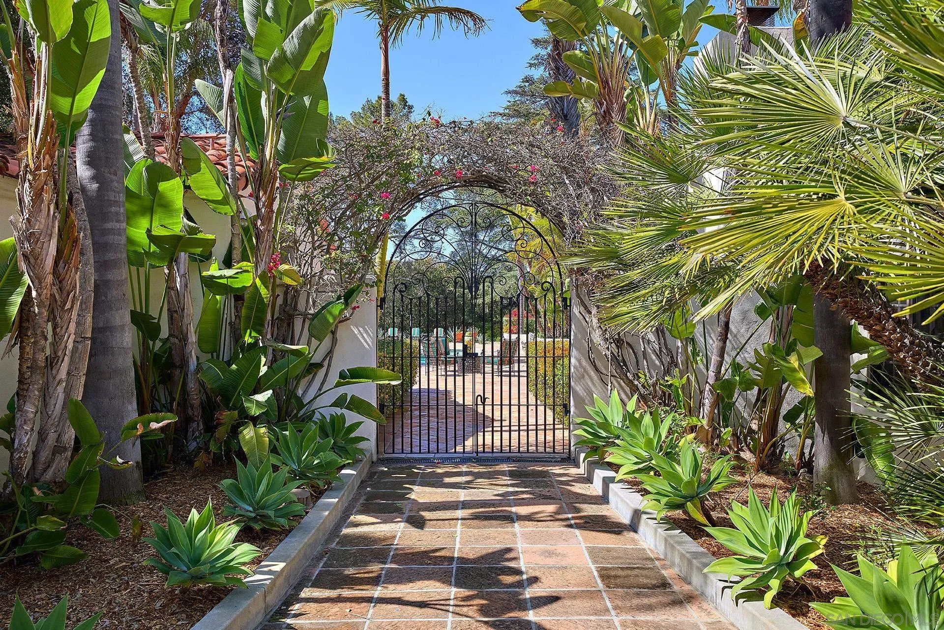 6525 Lago Lindo Rancho Santa Fe, CA 92067 - Photo 39 of 47 Entry to the pool and patio retreat.