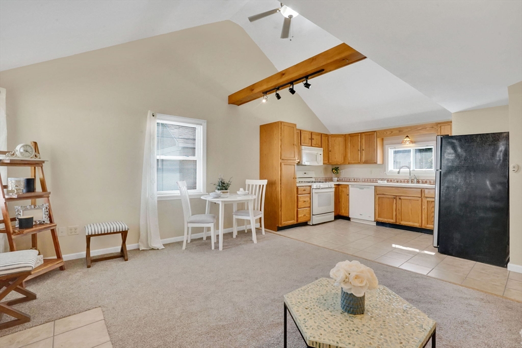 238 Merrimac Avenue Springfield, MA 01104 - Photo 12 of 37 a view of kitchen with furniture and wooden floor