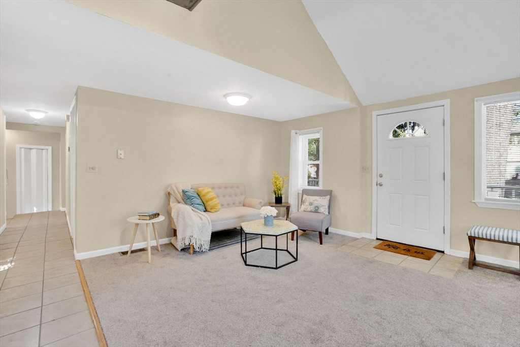 238 Merrimac Avenue Springfield, MA 01104 - Photo 14 of 37 a living room with furniture and a window