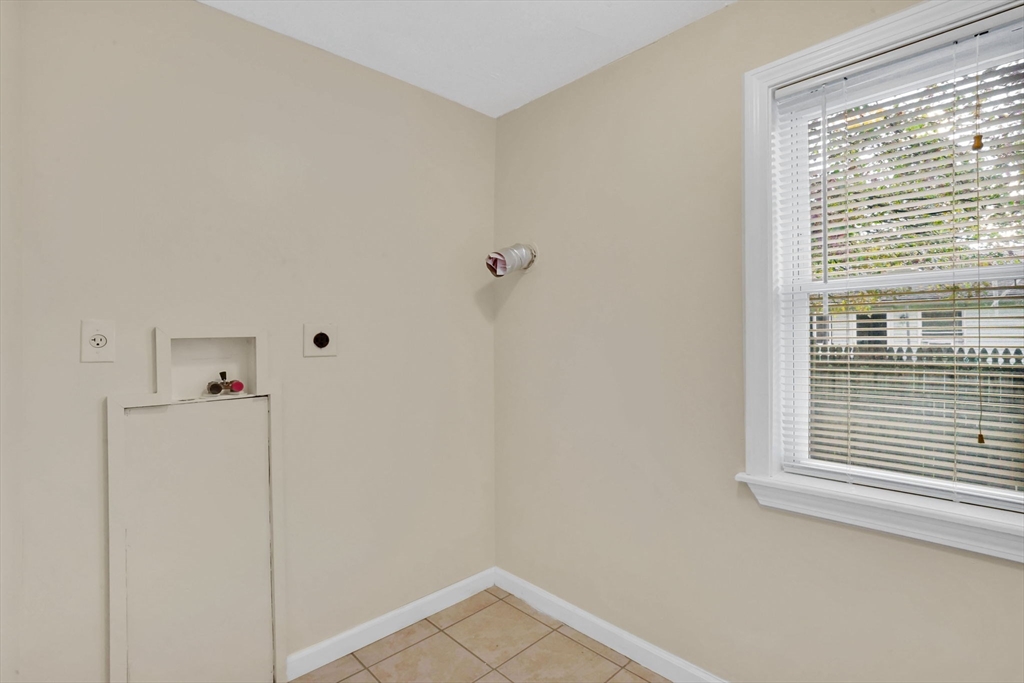 238 Merrimac Avenue Springfield, MA 01104 - Photo 23 of 37 a view of a closet and window