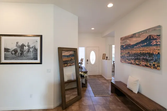 a bedroom with a bed and dresser