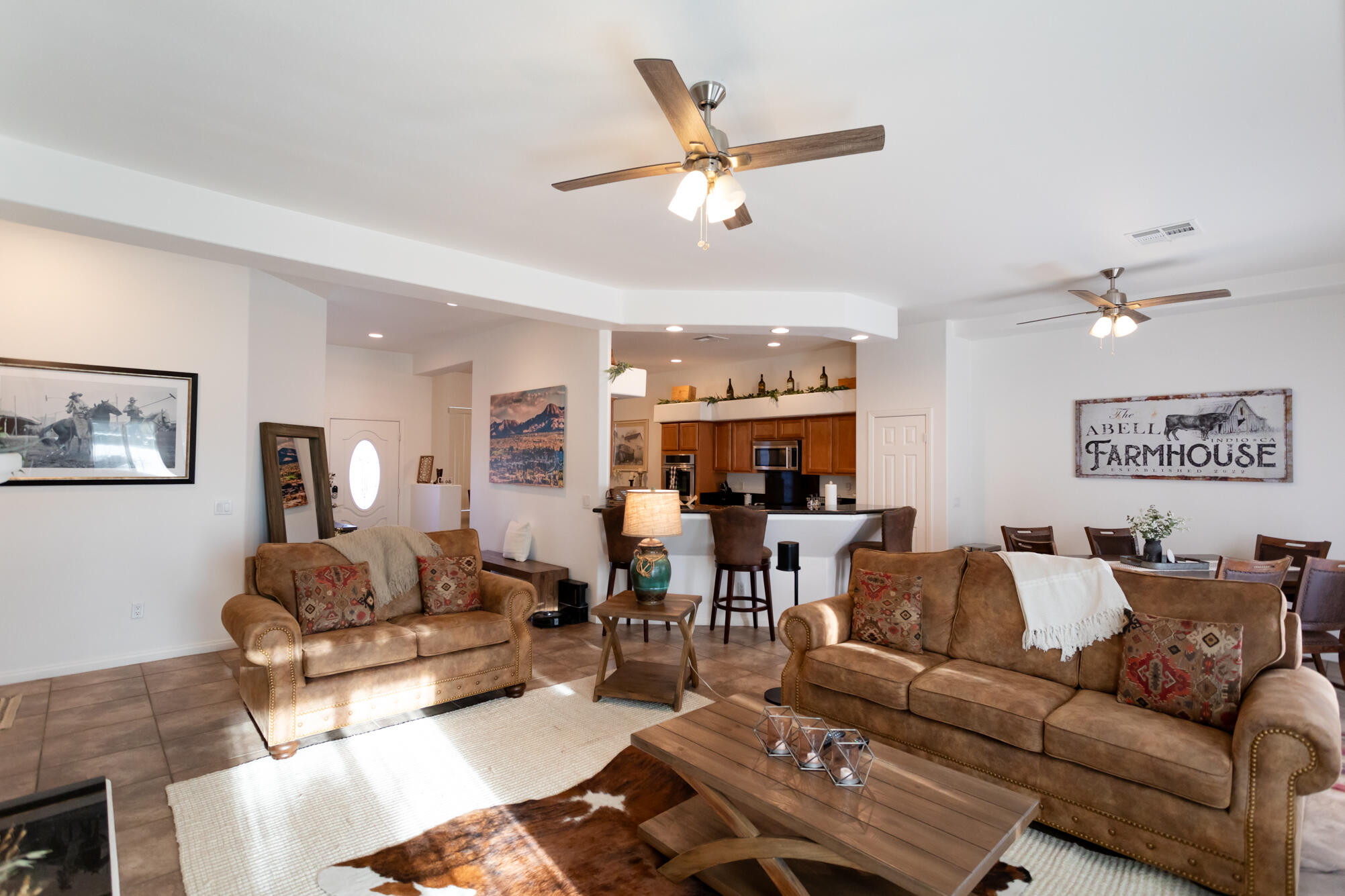 48305 Pic Way Indio, CA 92201 - Photo 33 of 80 a living room with furniture and a view of kitchen