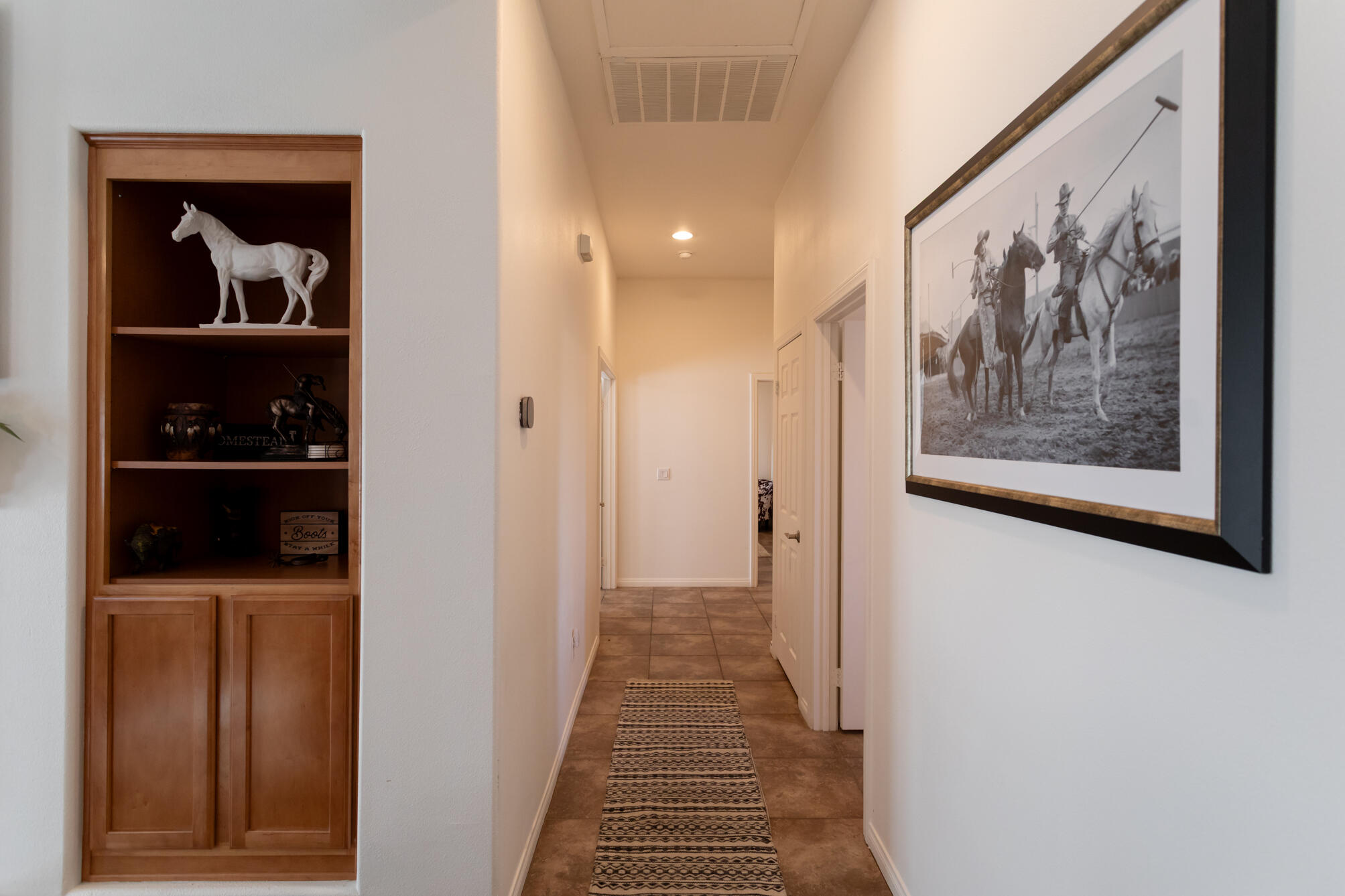 48305 Pic Way Indio, CA 92201 - Photo 38 of 80 a view of a hallway with wooden floor and closet