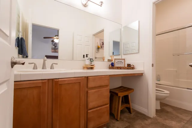 a close view of a storage & utility room with two washing machine