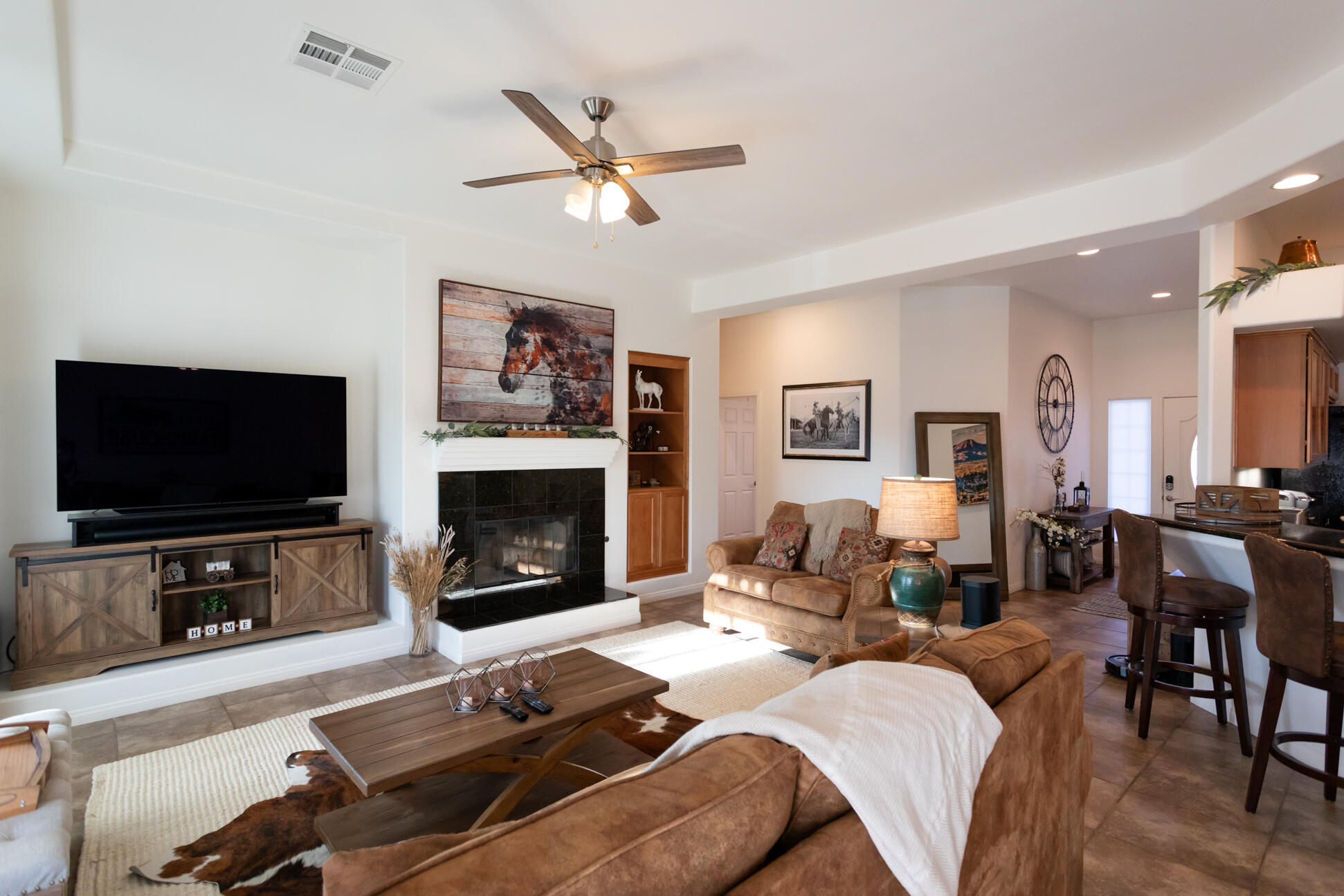 48305 Pic Way Indio, CA 92201 - Photo 9 of 80 a living room with furniture and a flat screen tv