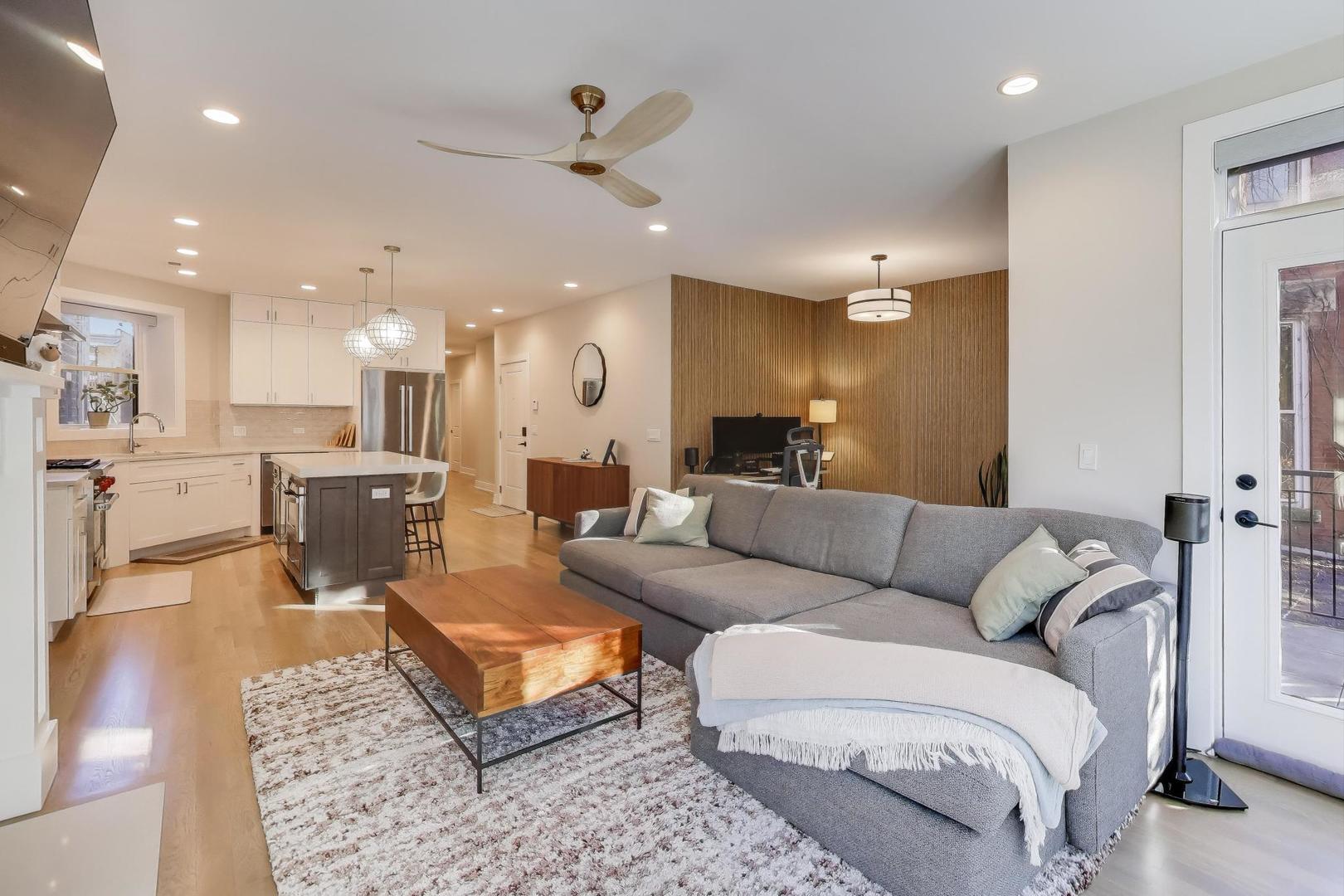 3533 North Fremont Street, Unit 2 Chicago, IL 60657 - Photo 4 of 30 a living room with furniture and kitchen view
