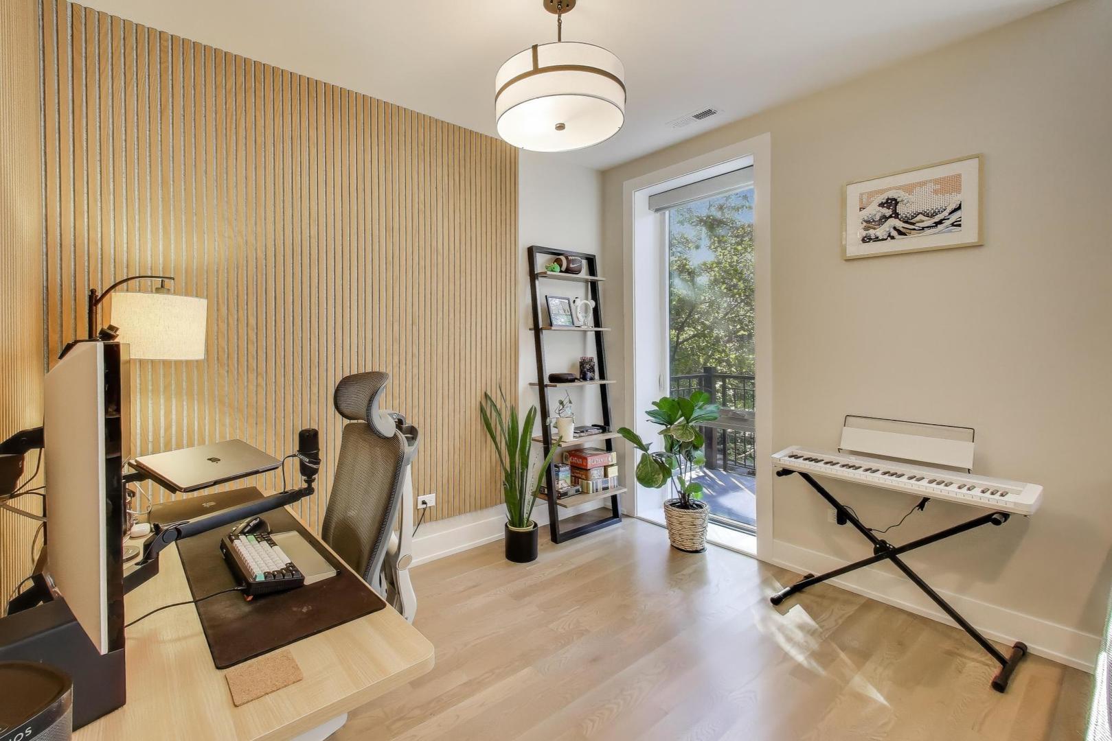 3533 North Fremont Street, Unit 2 Chicago, IL 60657 - Photo 6 of 30 a view of a room with gym equipment