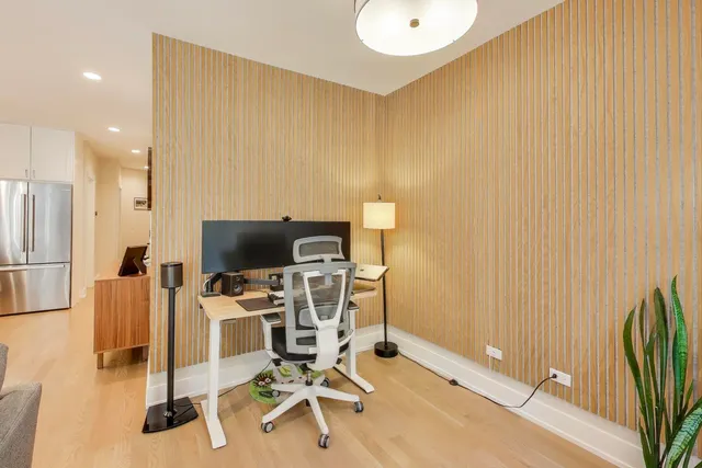 a view of a kitchen with dining area and appliances