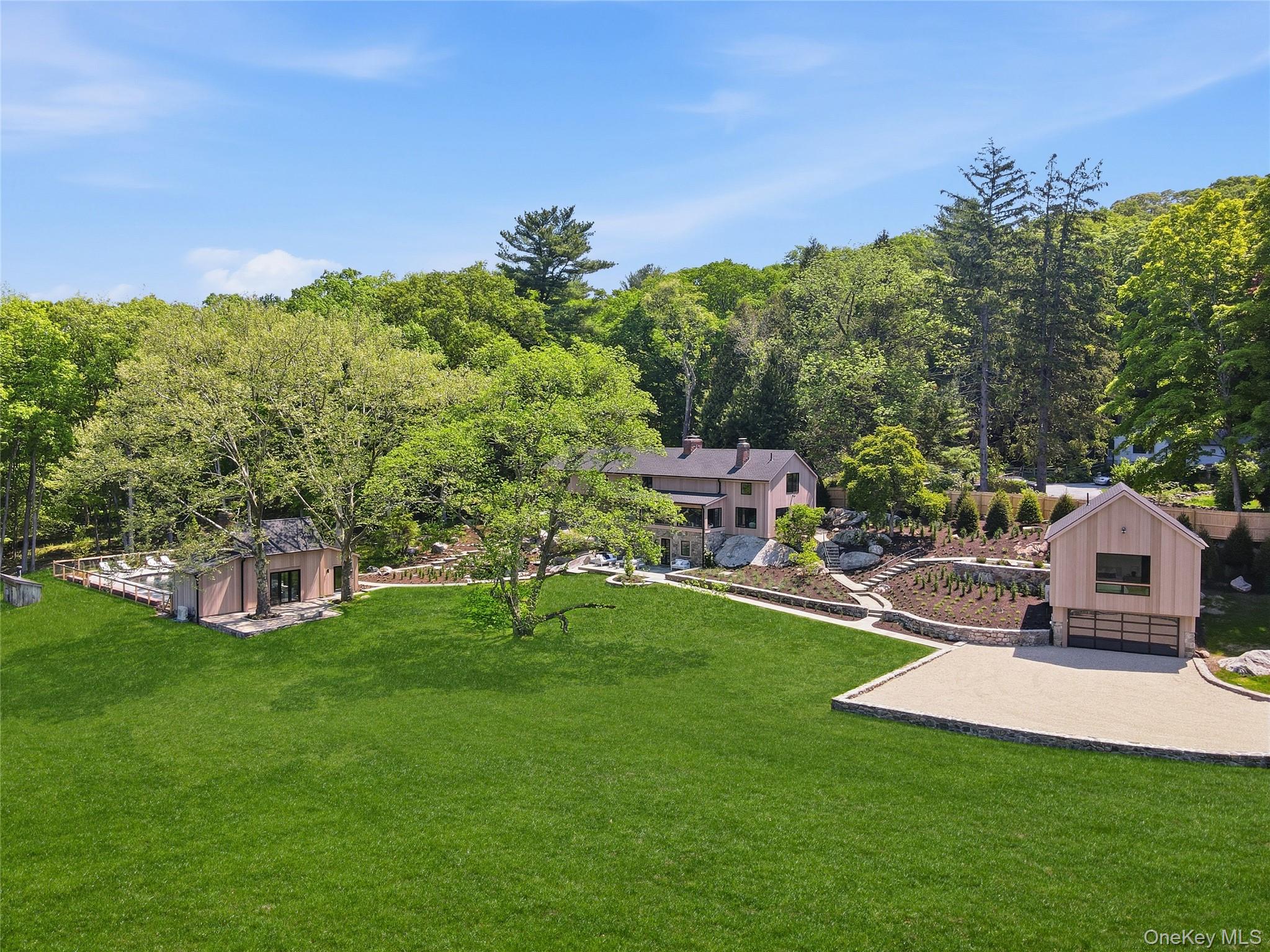 39 Old Snake Hill Road Pound Ridge, NY 10576 - Photo 1 of 37 a view of a house with a yard porch and sitting area