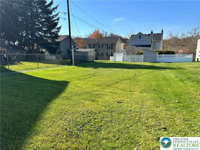 a view of a house with a swimming pool