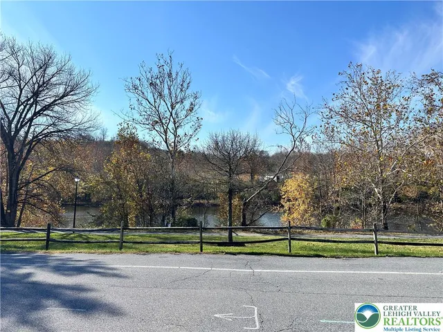 a view of road and trees
