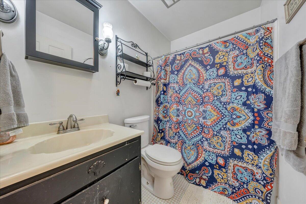 2231 Ranch Road Northwest Roanoke, VA 24017 - Photo 13 of 24 a bathroom with a sink and a toilet