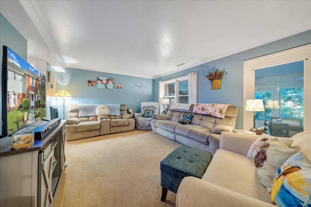 2231 Ranch Road Northwest Roanoke, VA 24017 - Photo 6 of 24 a living room with furniture and a flat screen tv