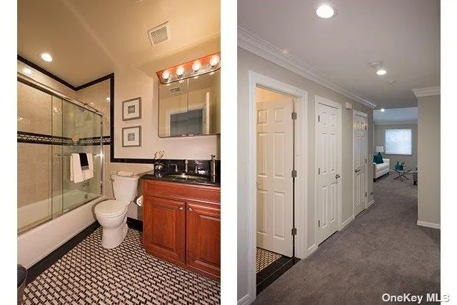 a bathroom with a sink a toilet a mirror and shower