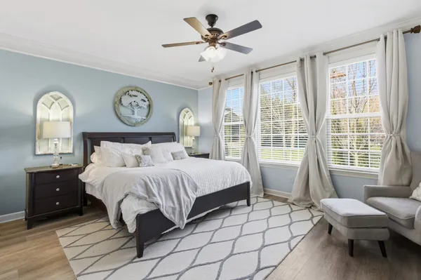 an aerial view of residential houses with city view