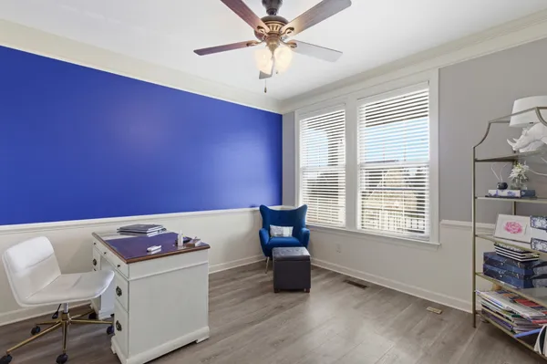 a bathroom with a sink vanity and a mirror