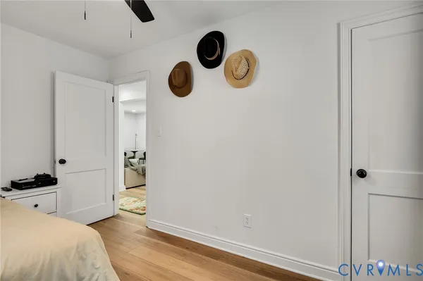 a bedroom with a bed and cabinets