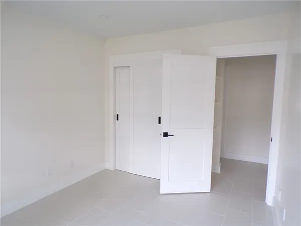 a view of storage and utility room with washer and dryer