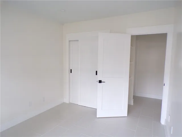 a view of storage and utility room with washer and dryer