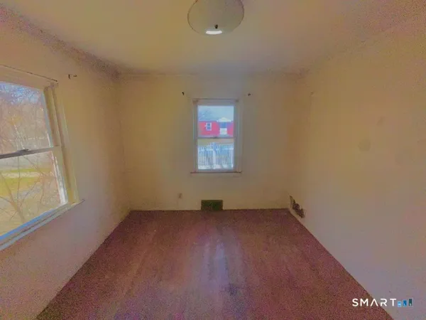 an empty room with a window
