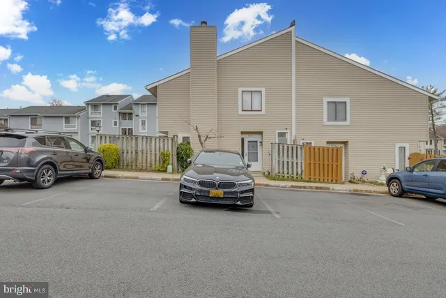 a car parked in front of a house