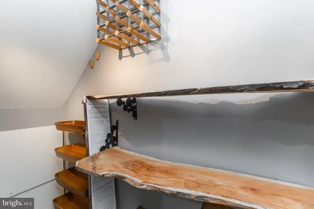 a bathroom with a granite countertop sink and vanity